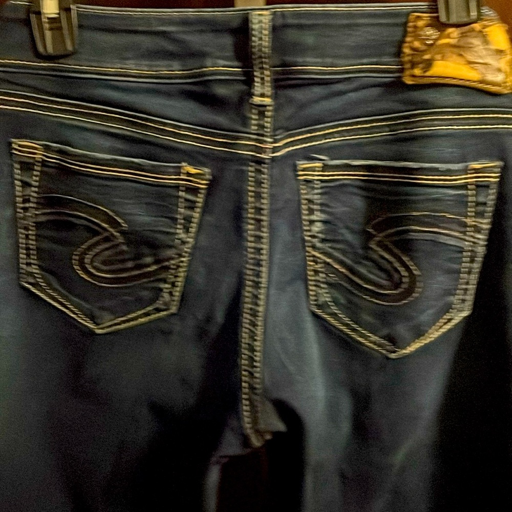 Like new silver slim boot waist 28 length 33.